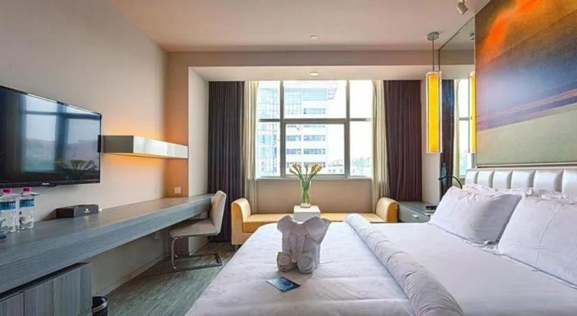 Bed in Jinjiang Metropolo Hotel - Qingdao Chengyang District Government