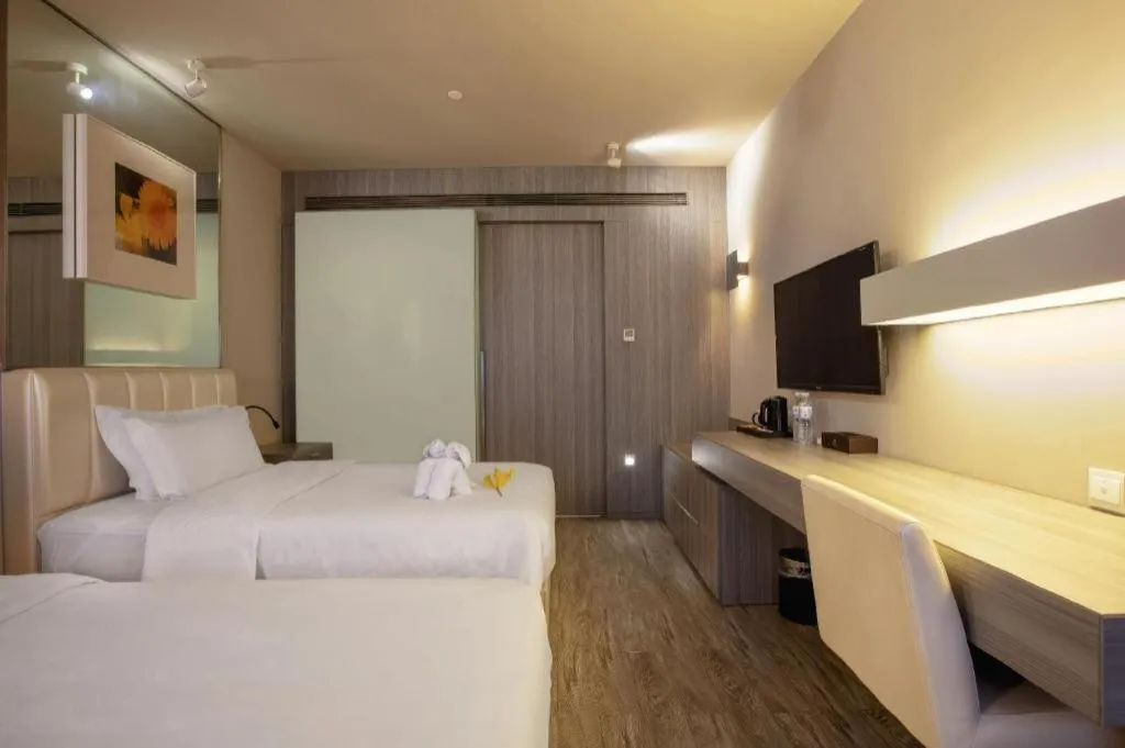 Bed in Jinjiang Metropolo Hotel - Qingdao Chengyang District Government