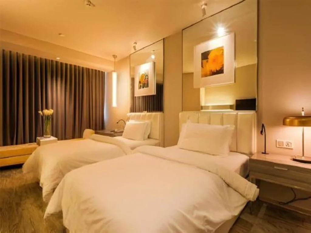 Bed in Jinjiang Metropolo Hotel - Qingdao Chengyang District Government