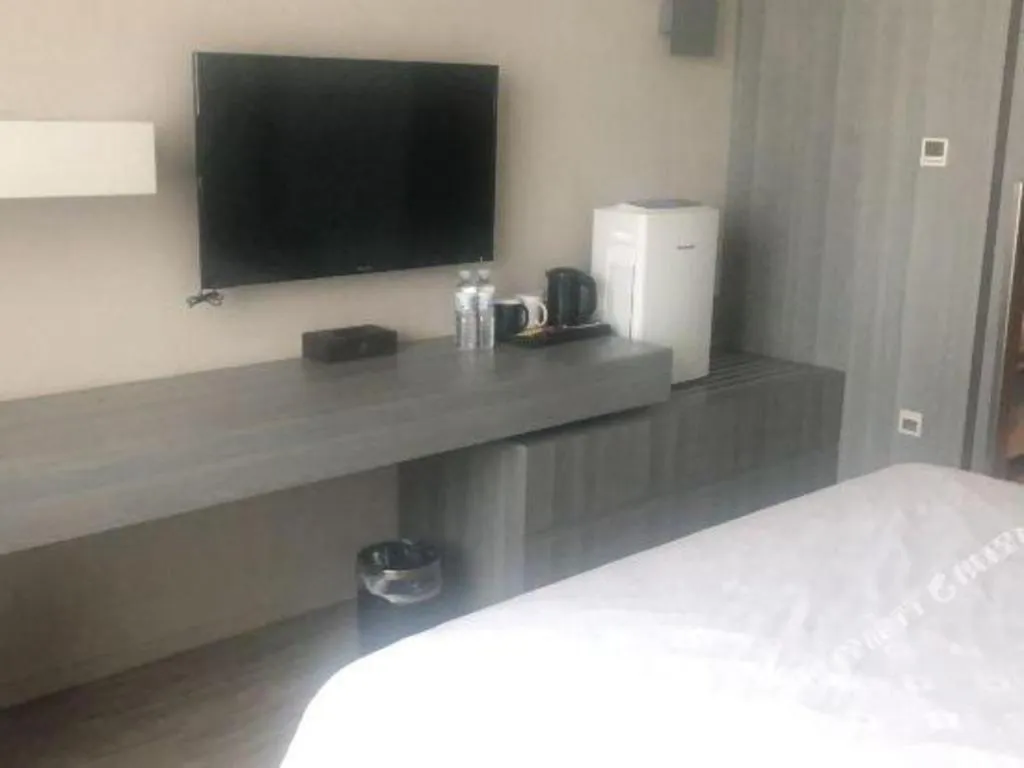 Bed in Jinjiang Metropolo Hotel - Qingdao Chengyang District Government