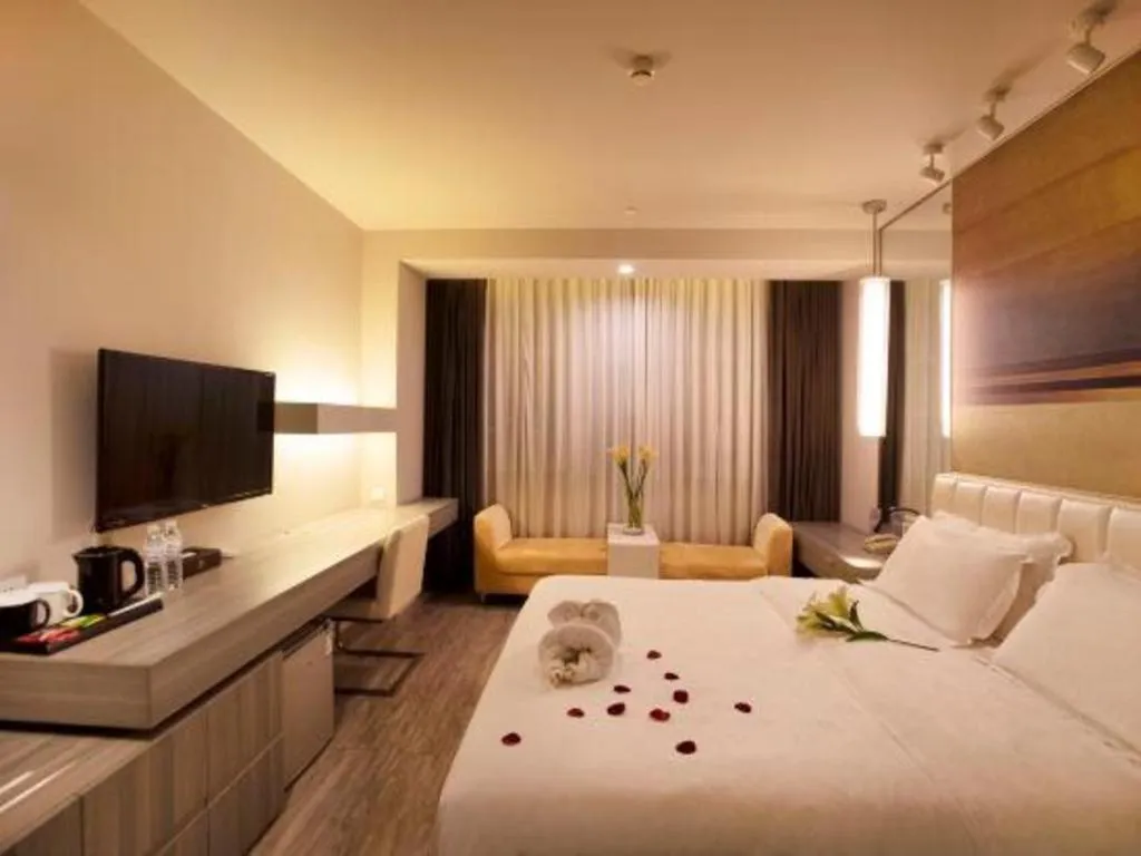 Bed in Jinjiang Metropolo Hotel - Qingdao Chengyang District Government