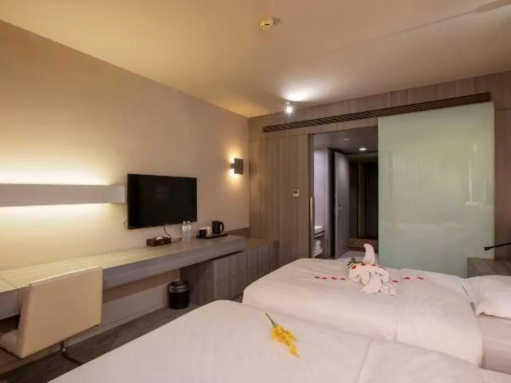 Bed in Jinjiang Metropolo Hotel - Qingdao Chengyang District Government