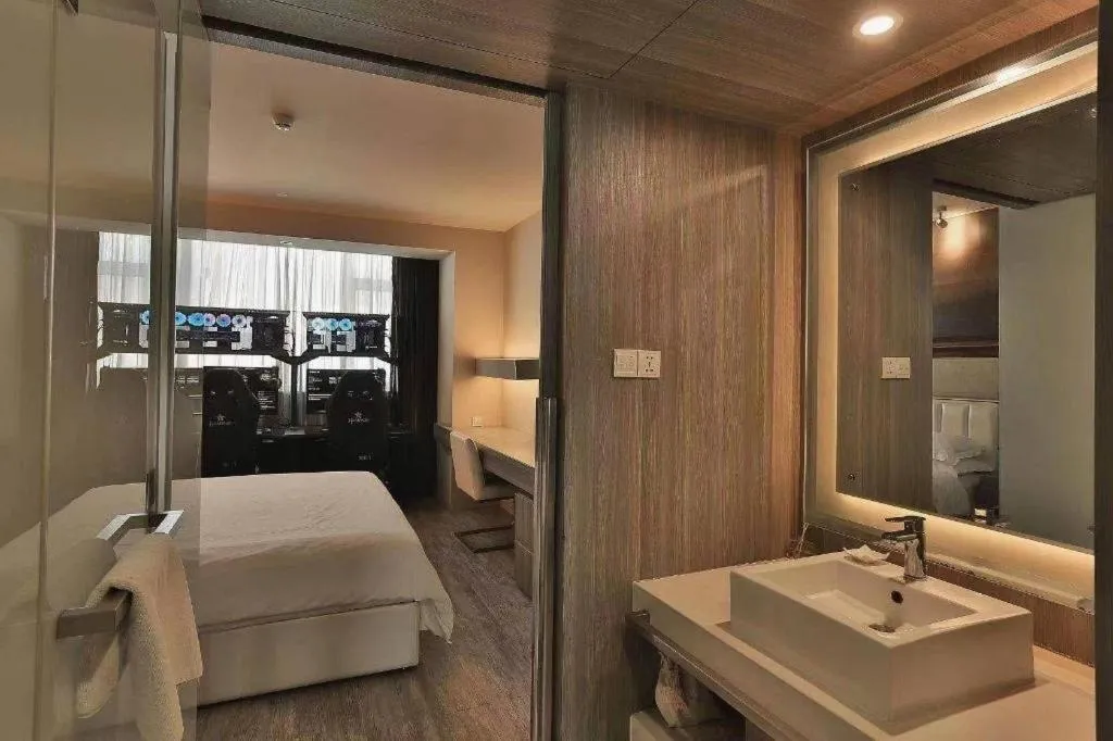 Bed in Jinjiang Metropolo Hotel - Qingdao Chengyang District Government