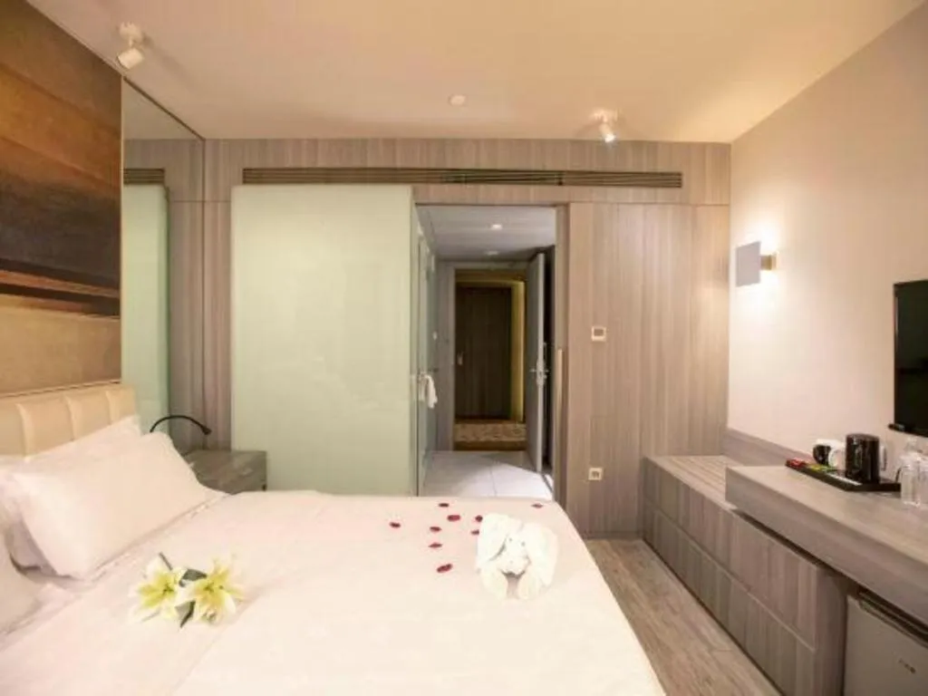 Bed in Jinjiang Metropolo Hotel - Qingdao Chengyang District Government