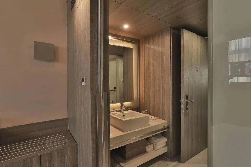 Bed in Jinjiang Metropolo Hotel - Qingdao Chengyang District Government