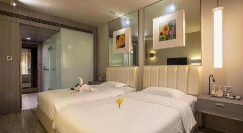 Bed in Jinjiang Metropolo Hotel - Qingdao Chengyang District Government