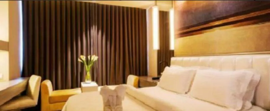 Bed in Jinjiang Metropolo Hotel - Qingdao Chengyang District Government