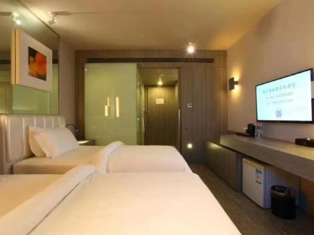 Bed in Jinjiang Metropolo Hotel - Qingdao Chengyang District Government