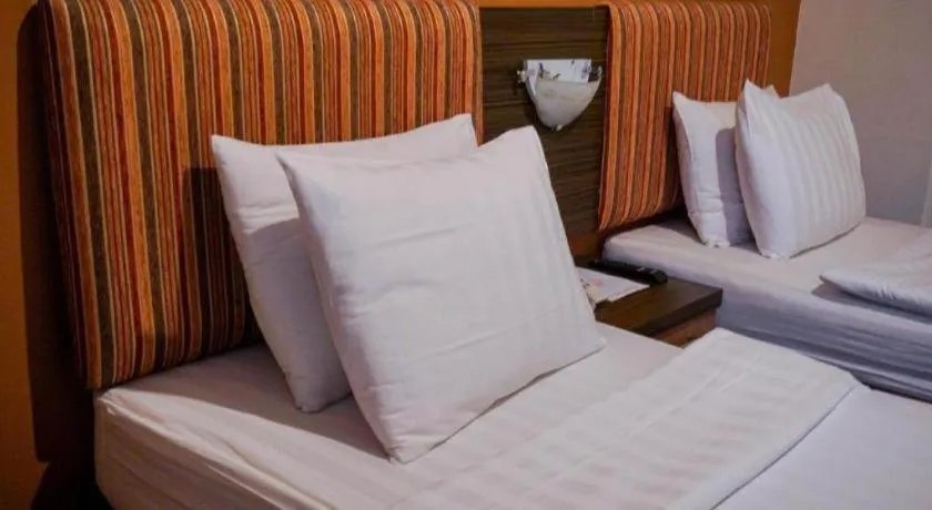 Bed in Hotel Pantes Semarang