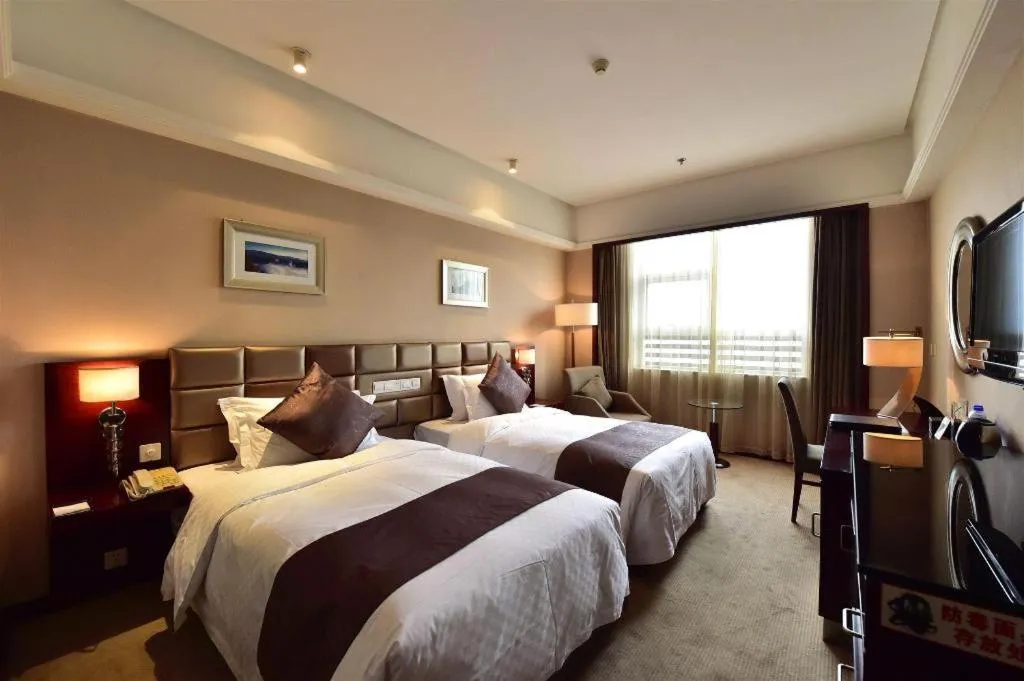 Bed in Pingyao Fengyan Jianguo Hotel