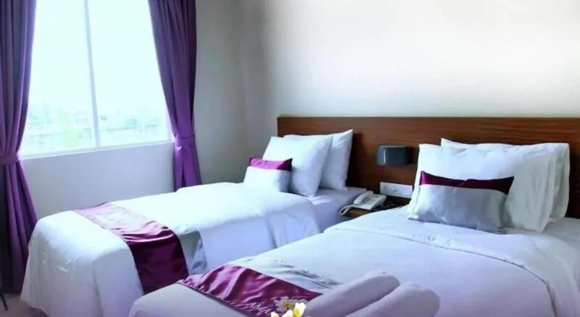 Bed in Amantis Hotel