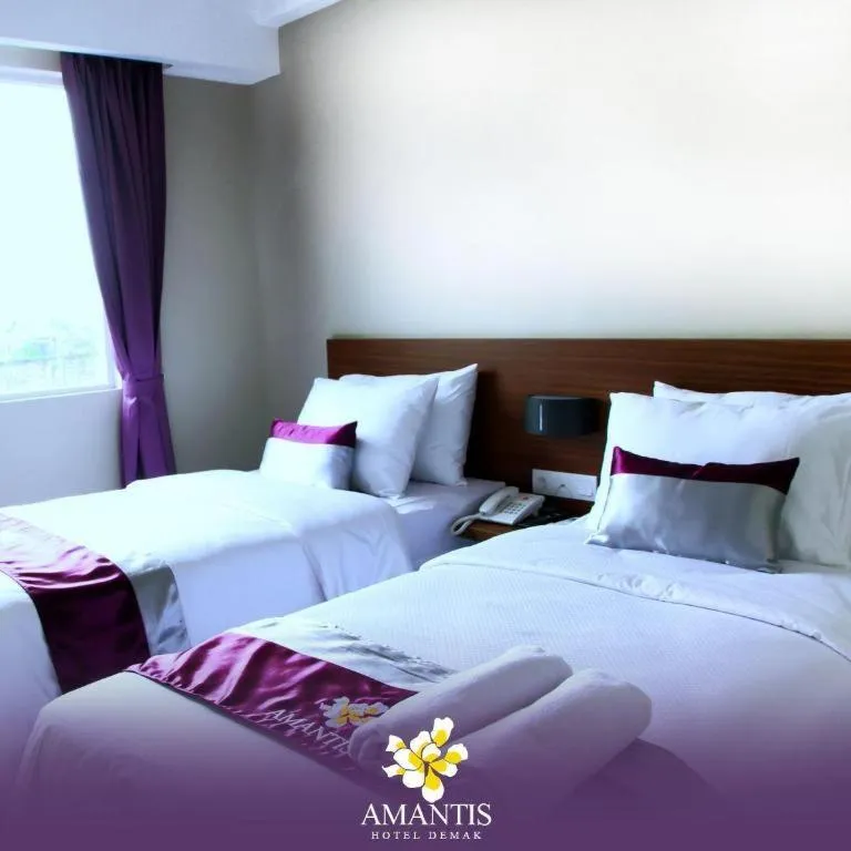 Bed in Amantis Hotel