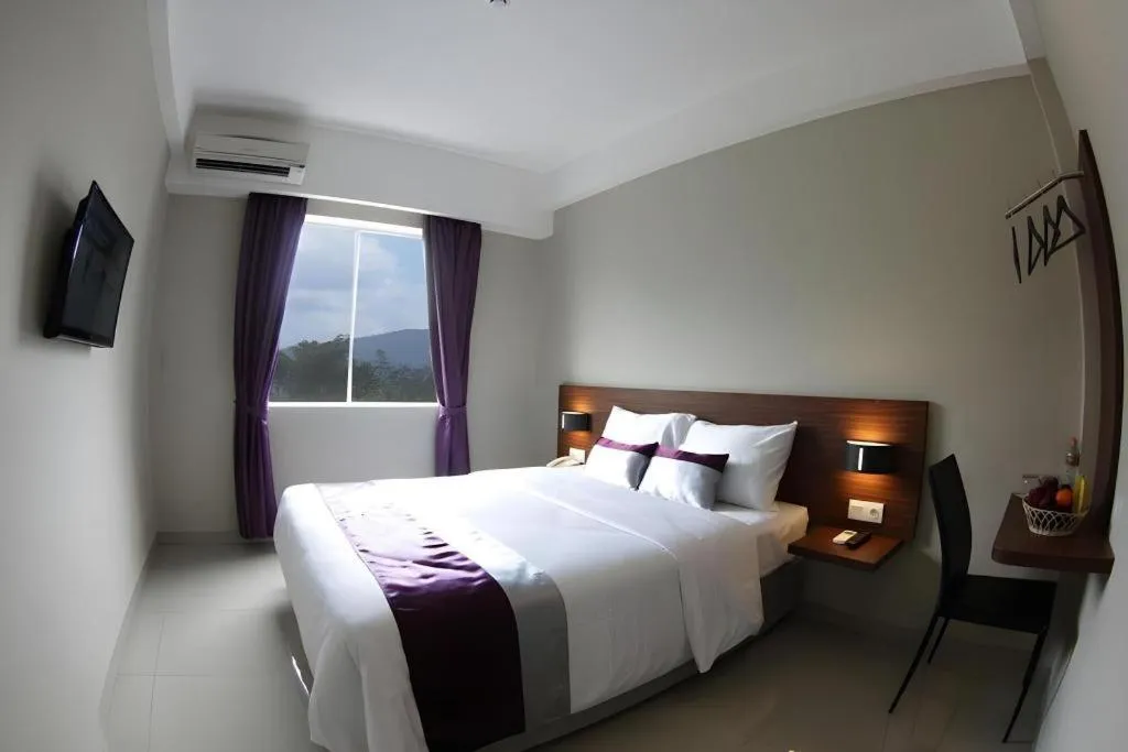 Bed in Amantis Hotel