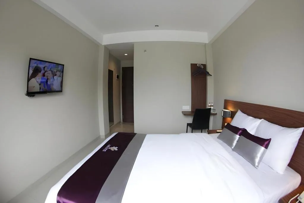 Bed in Amantis Hotel