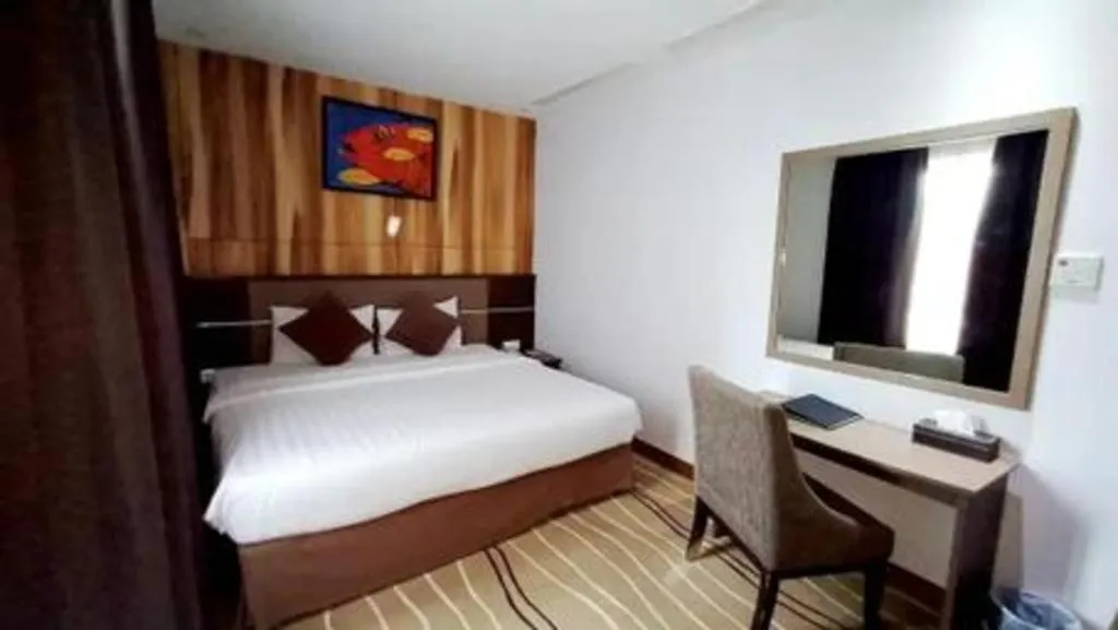 Bed in D Maleo Hotel Makassar