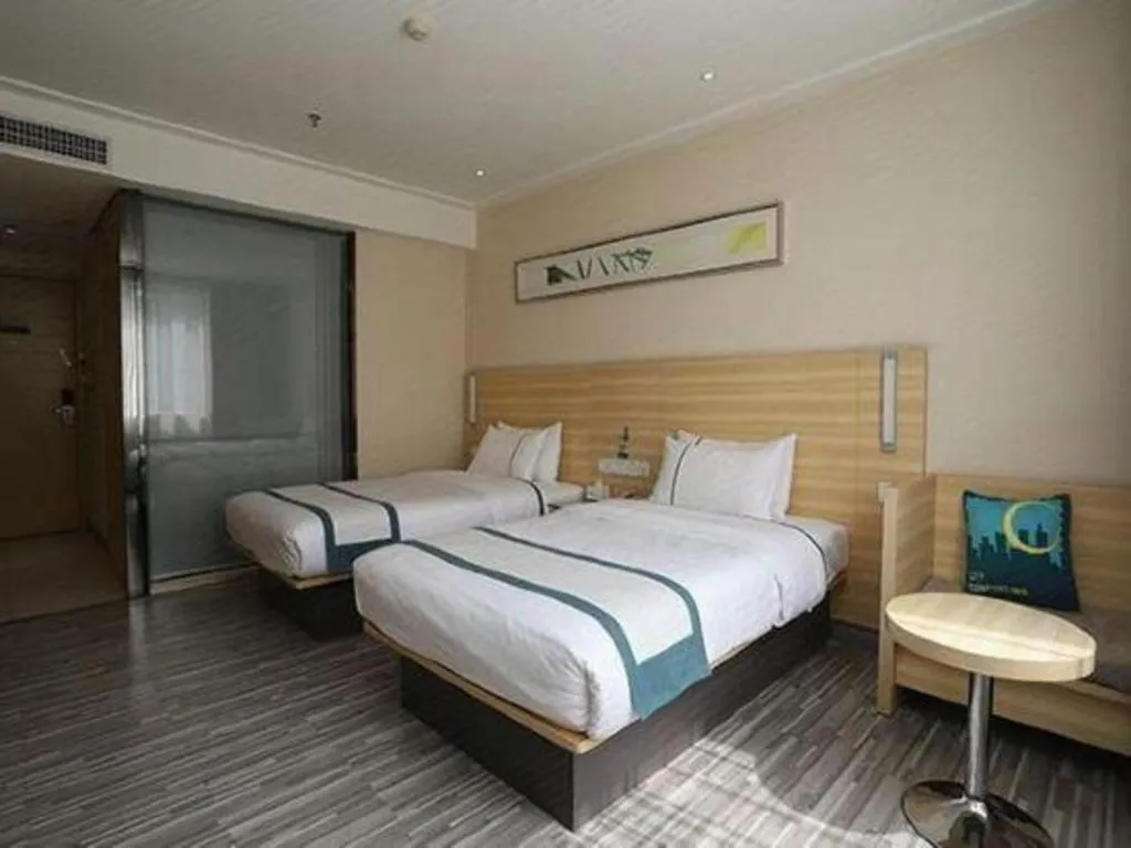 Bed in City Comfort Inn Guangzhou Baiyun Mountain