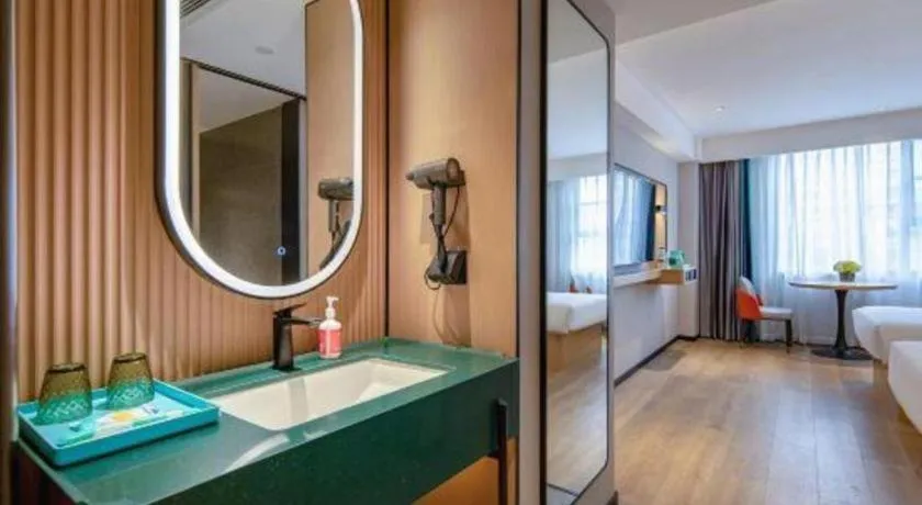 Bed in City Comfort Inn Guangzhou Baiyun Mountain