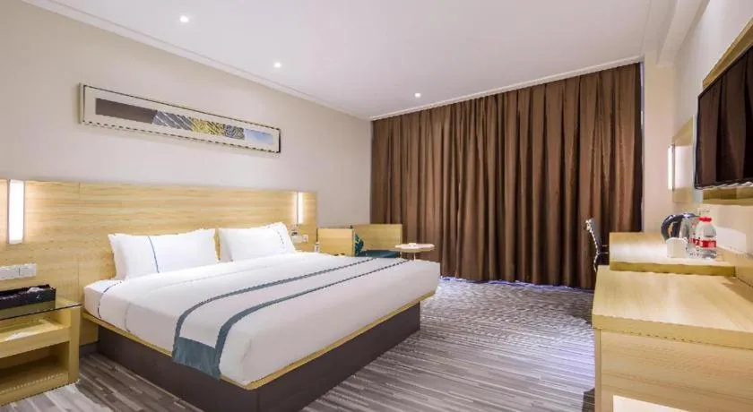 Bed in City Comfort Inn Guangzhou Baiyun Mountain