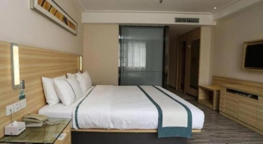 Bed in City Comfort Inn Guangzhou Baiyun Mountain