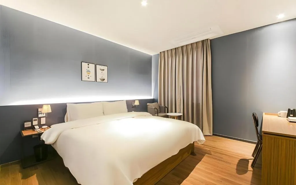 Bed in Gimhae Perfect Hotel