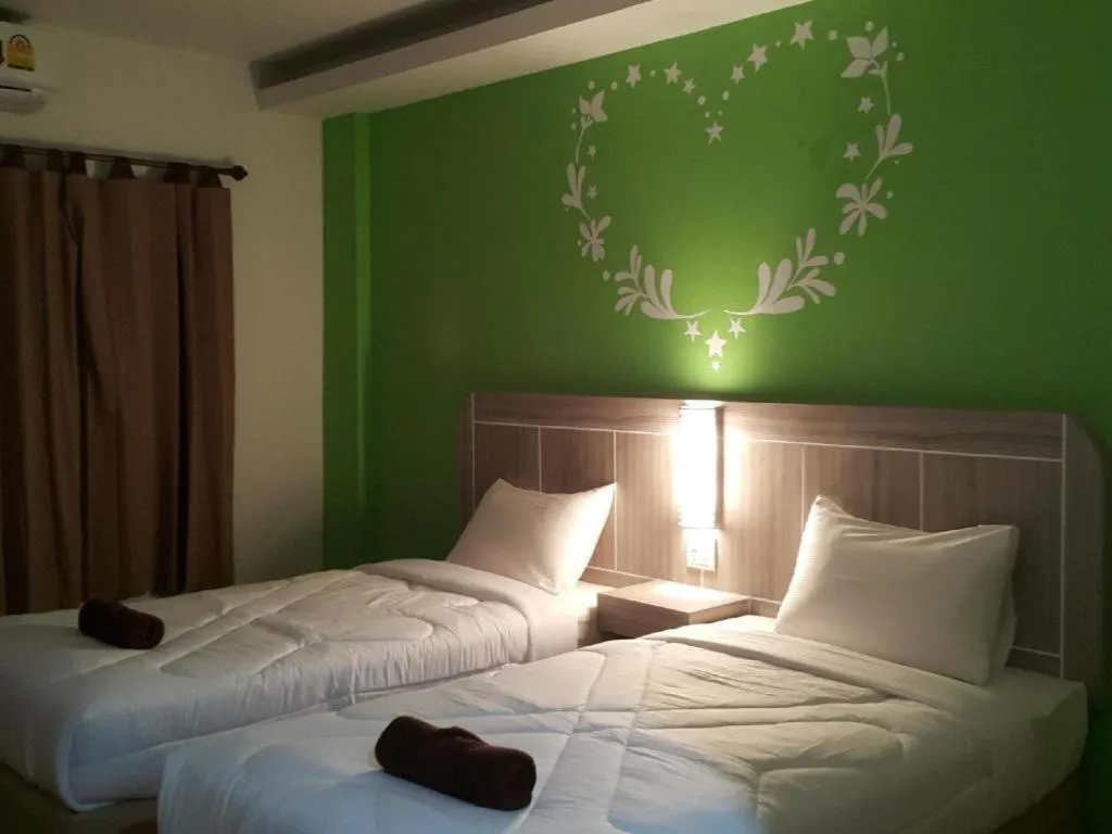 Bed in Silayok Grand Hotel