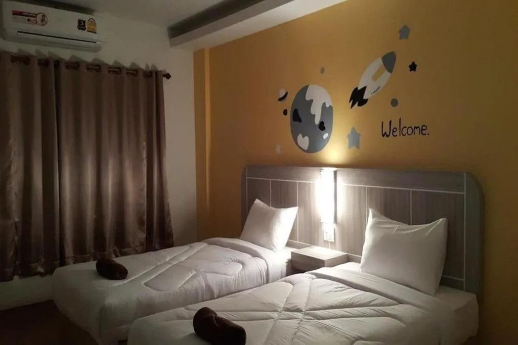 Bed in Silayok Grand Hotel