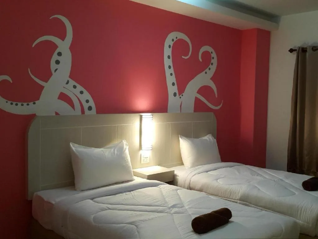 Bed in Silayok Grand Hotel