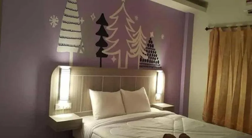 Bed in Silayok Grand Hotel