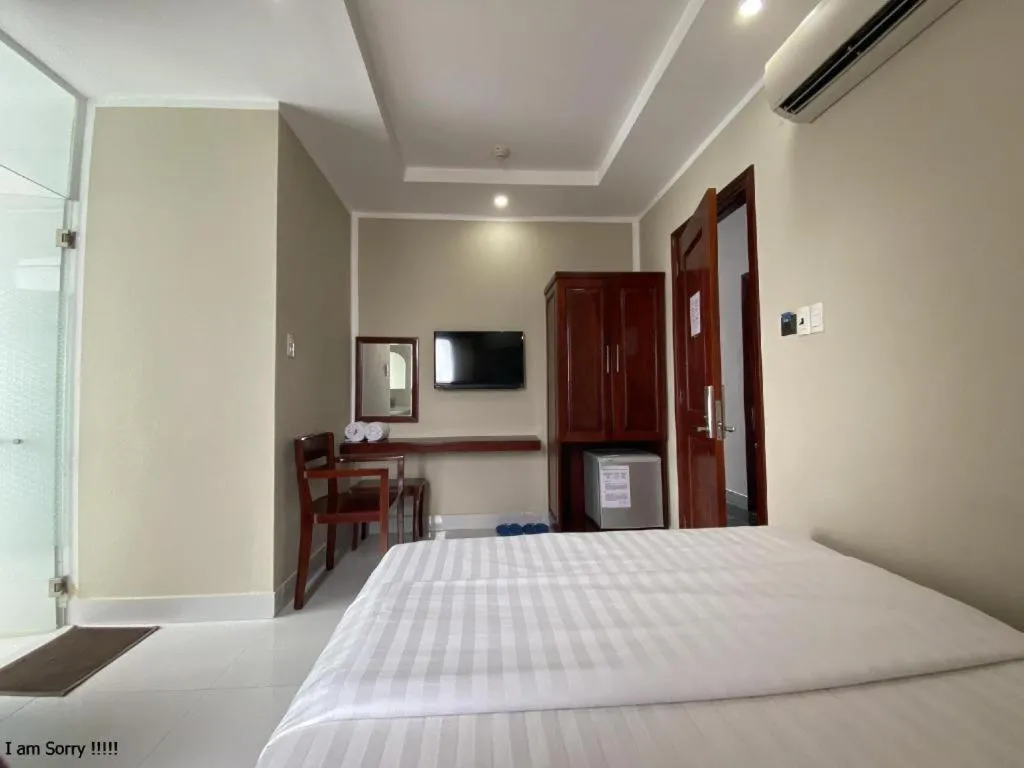 Bed in Mi Linh Hotel