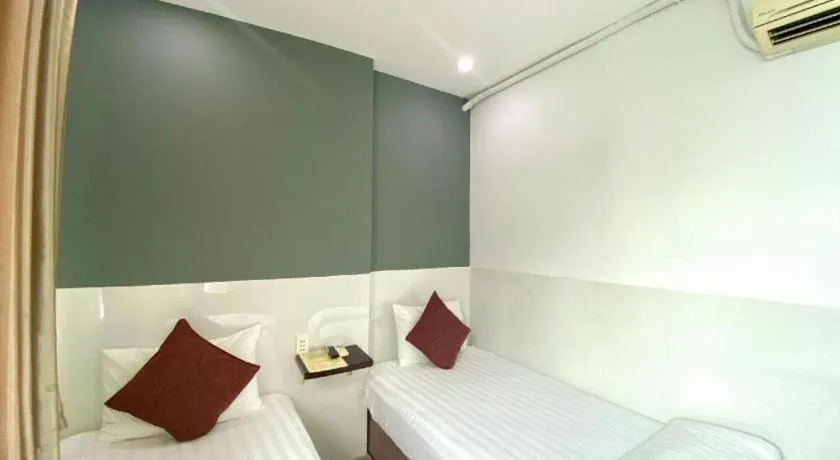 Bed in Mi Linh Hotel