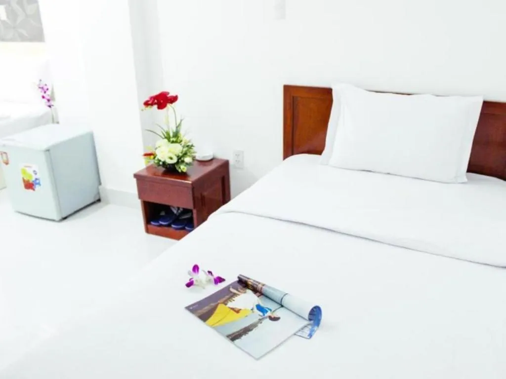 Bed in Mi Linh Hotel