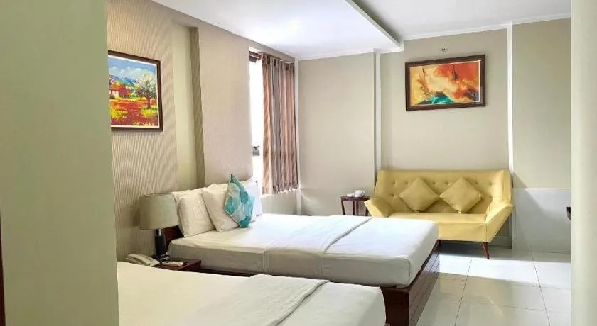 Bed in Mi Linh Hotel