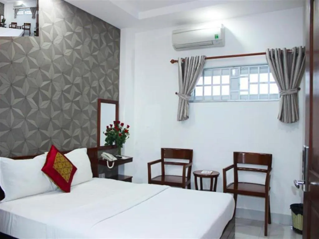 Bed in Mi Linh Hotel