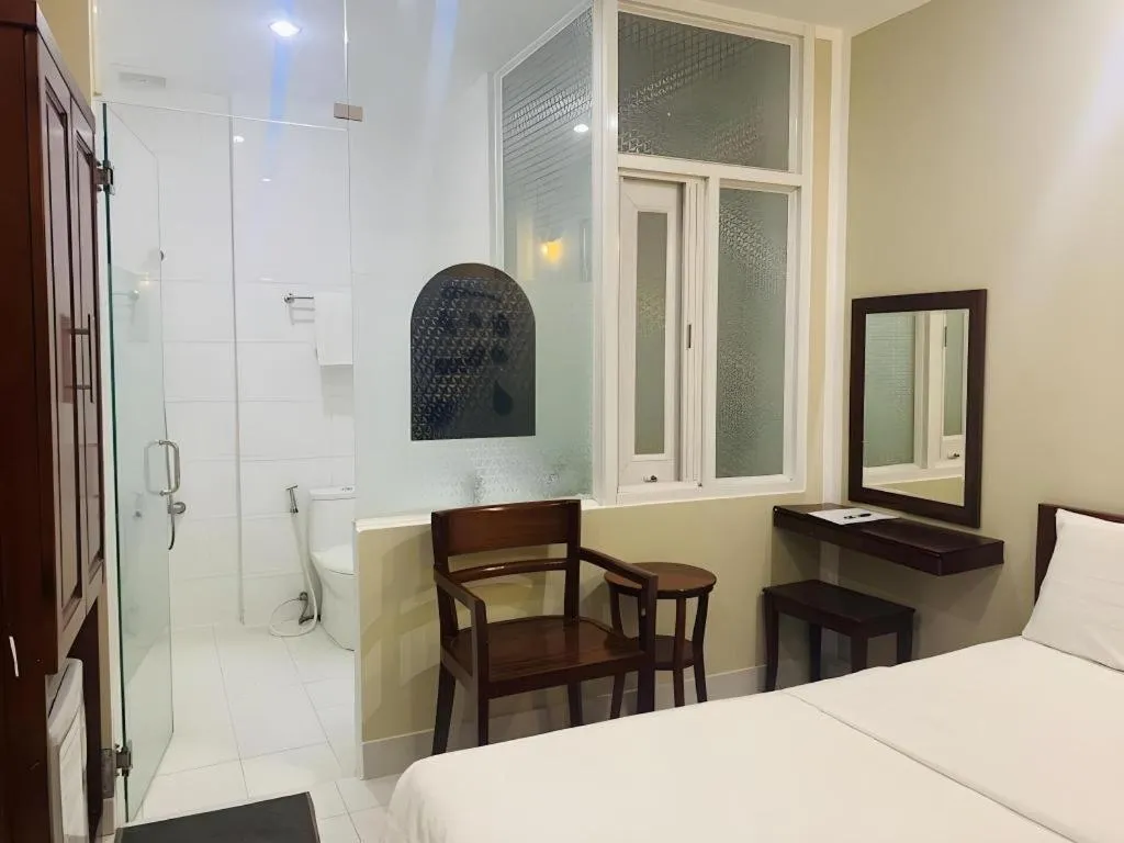 Bed in Mi Linh Hotel