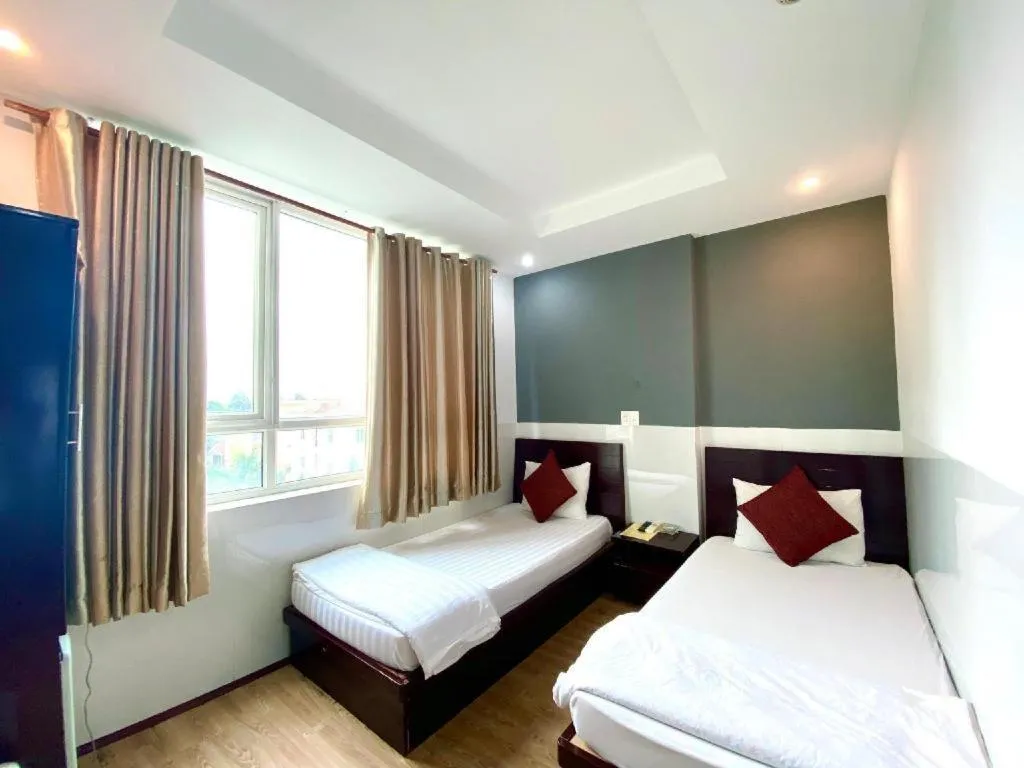 Bed in Mi Linh Hotel