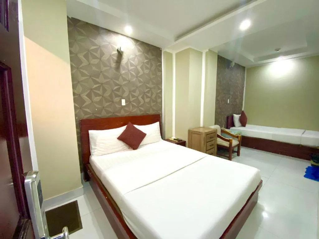 Bed in Mi Linh Hotel