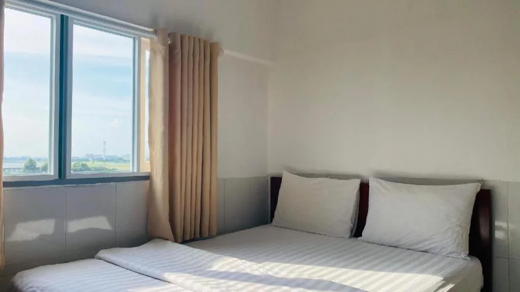 Bed in Mi Linh Hotel