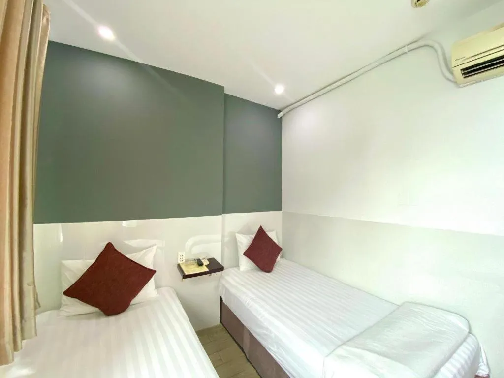 Bed in Mi Linh Hotel