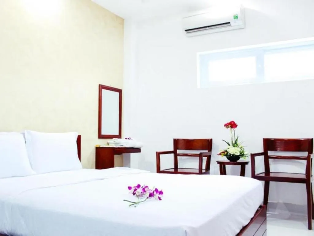 Bed in Mi Linh Hotel