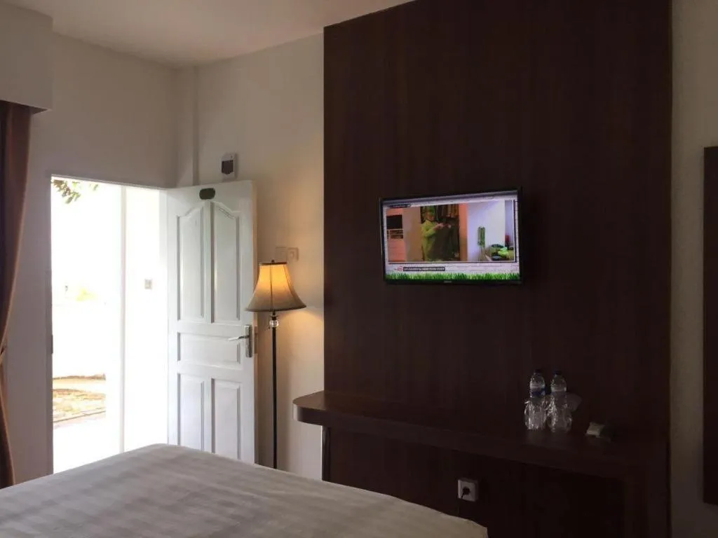 Bed in Satria Wisata Hotel