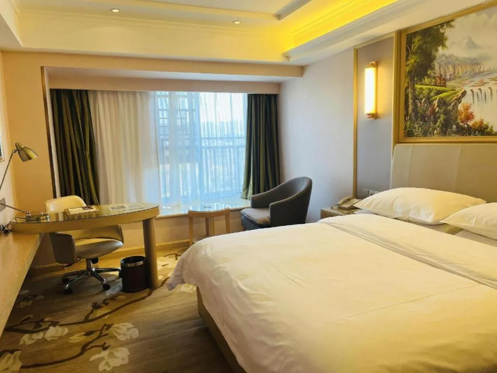 Bed in Vienna Hotel Yunnan Chunrong Street Qicai Yunan