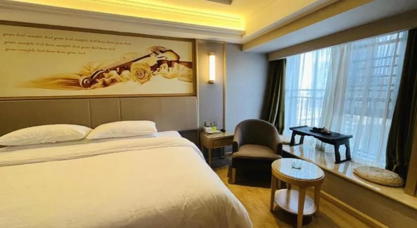 Bed in Vienna Hotel Yunnan Chunrong Street Qicai Yunan