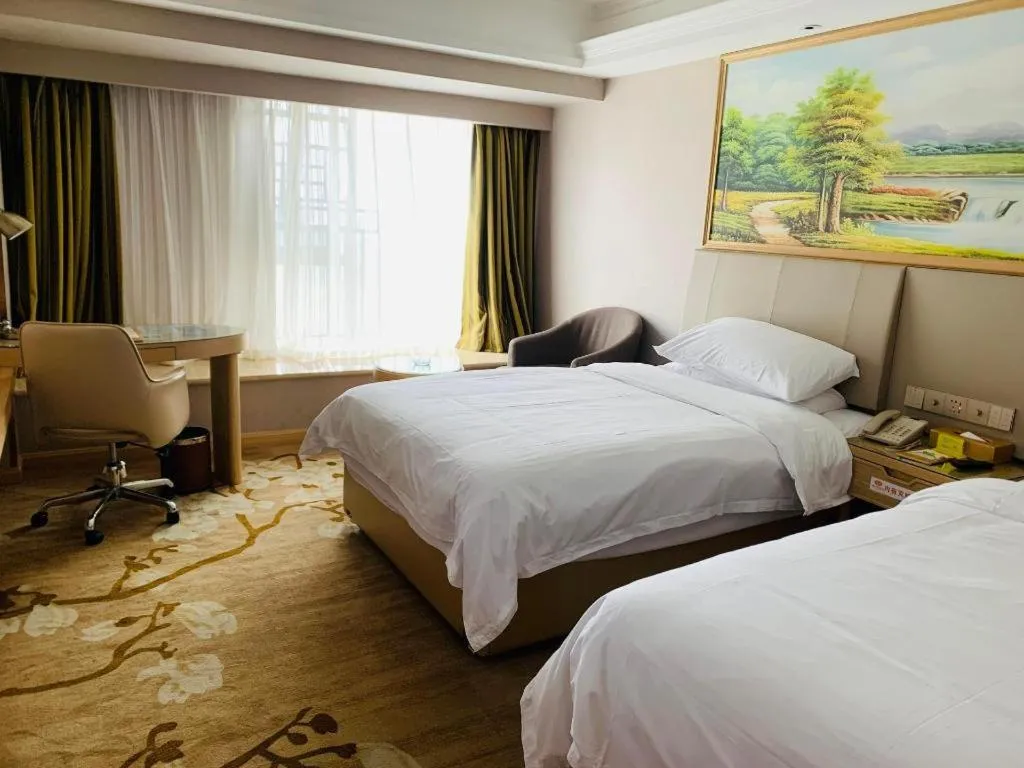 Bed in Vienna Hotel Yunnan Chunrong Street Qicai Yunan