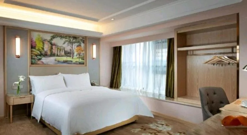 Bed in Vienna Hotel Yunnan Chunrong Street Qicai Yunan