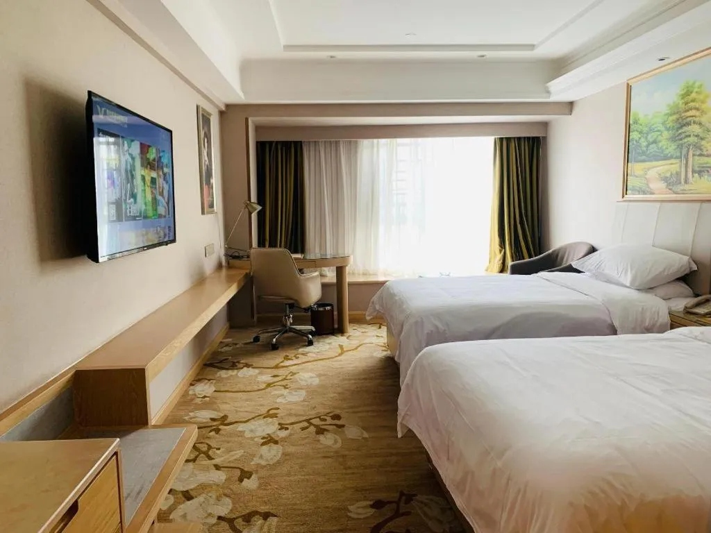 Bed in Vienna Hotel Yunnan Chunrong Street Qicai Yunan