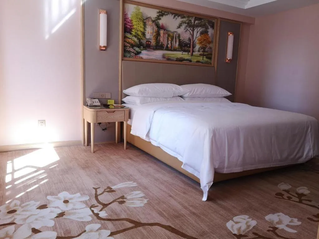 Bed in Vienna Hotel Yunnan Chunrong Street Qicai Yunan