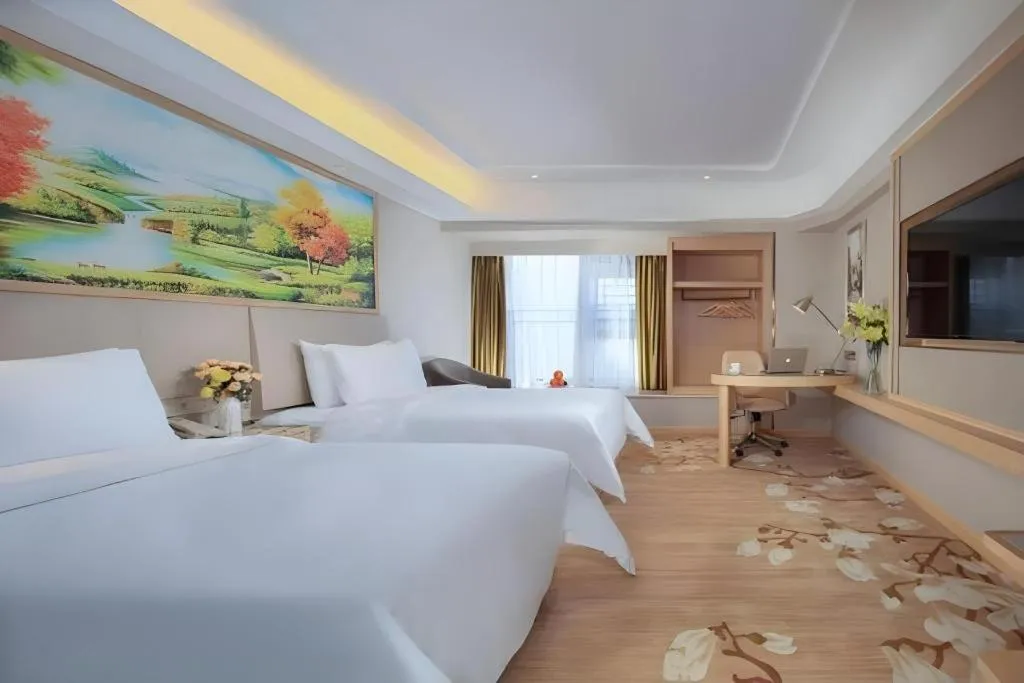 Bed in Vienna Hotel Yunnan Chunrong Street Qicai Yunan