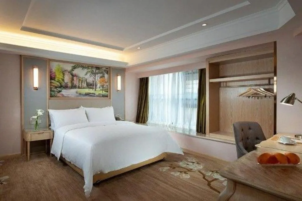 Bed in Vienna Hotel Yunnan Chunrong Street Qicai Yunan