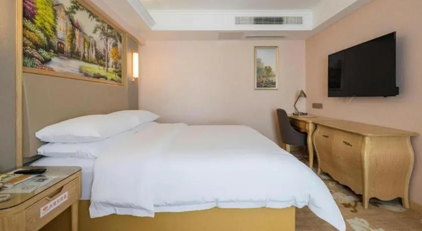 Bed in Vienna Hotel Yunnan Chunrong Street Qicai Yunan