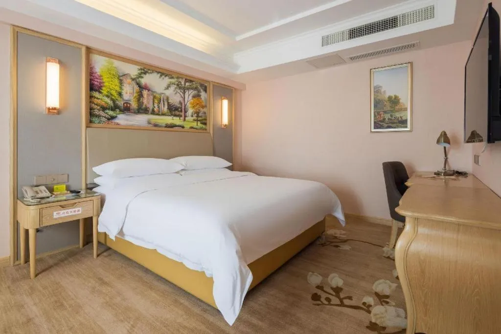 Bed in Vienna Hotel Yunnan Chunrong Street Qicai Yunan